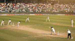 South Africa batting on Day 2 of the Guwahati Test match as Indian bowlers look for breakthroughs under clear morning sunlight.