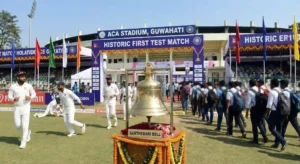 ACA Stadium in Guwahati prepared for its first-ever Test match with ceremonial Sarthebari bell displayed before play.